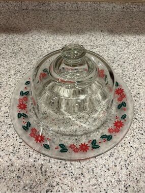 Cheese dome features a festive holly and berry pattern. Holiday Christmas